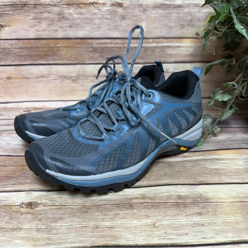 Merrell, Blue and Black Athletic Shoes Vibram. Size 7. In excellent condition!
